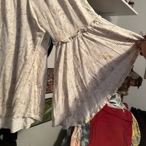 Long sleeved tee with flared sleeves